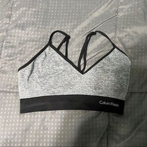 Calvin Klein sports bra no tag no padding pads measures like a small black gray